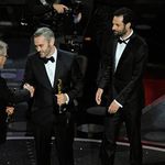 Steven Spielberg gives Iain Canning, Emile Sherman and Gareth Unwin, producers of The King's Speech their Oscars for Best Picture